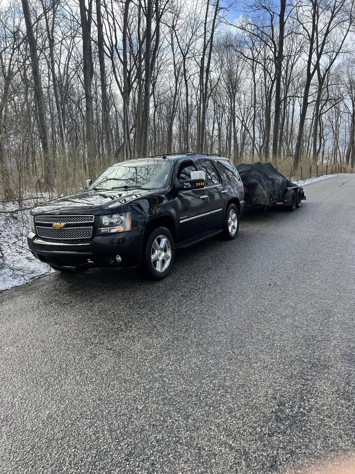 Q&Q Property Solutions hauling truck and trailer