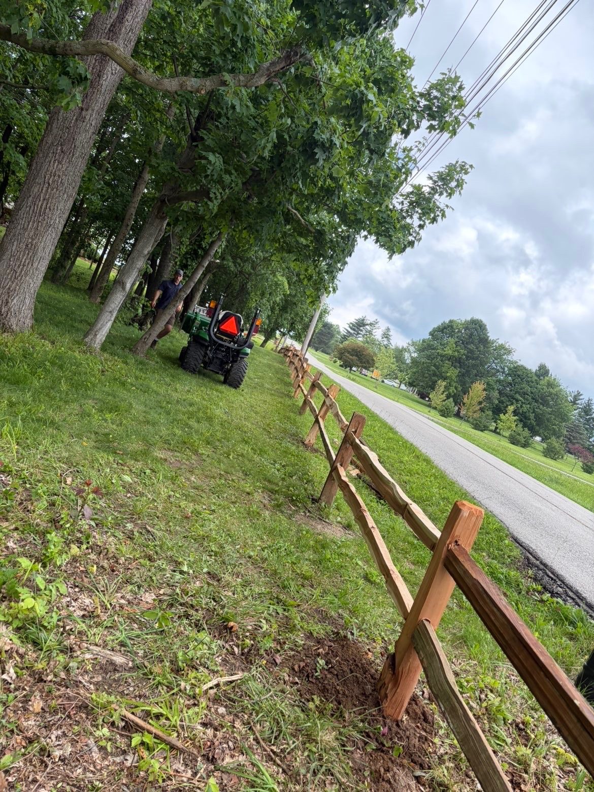Split rail fence along property line