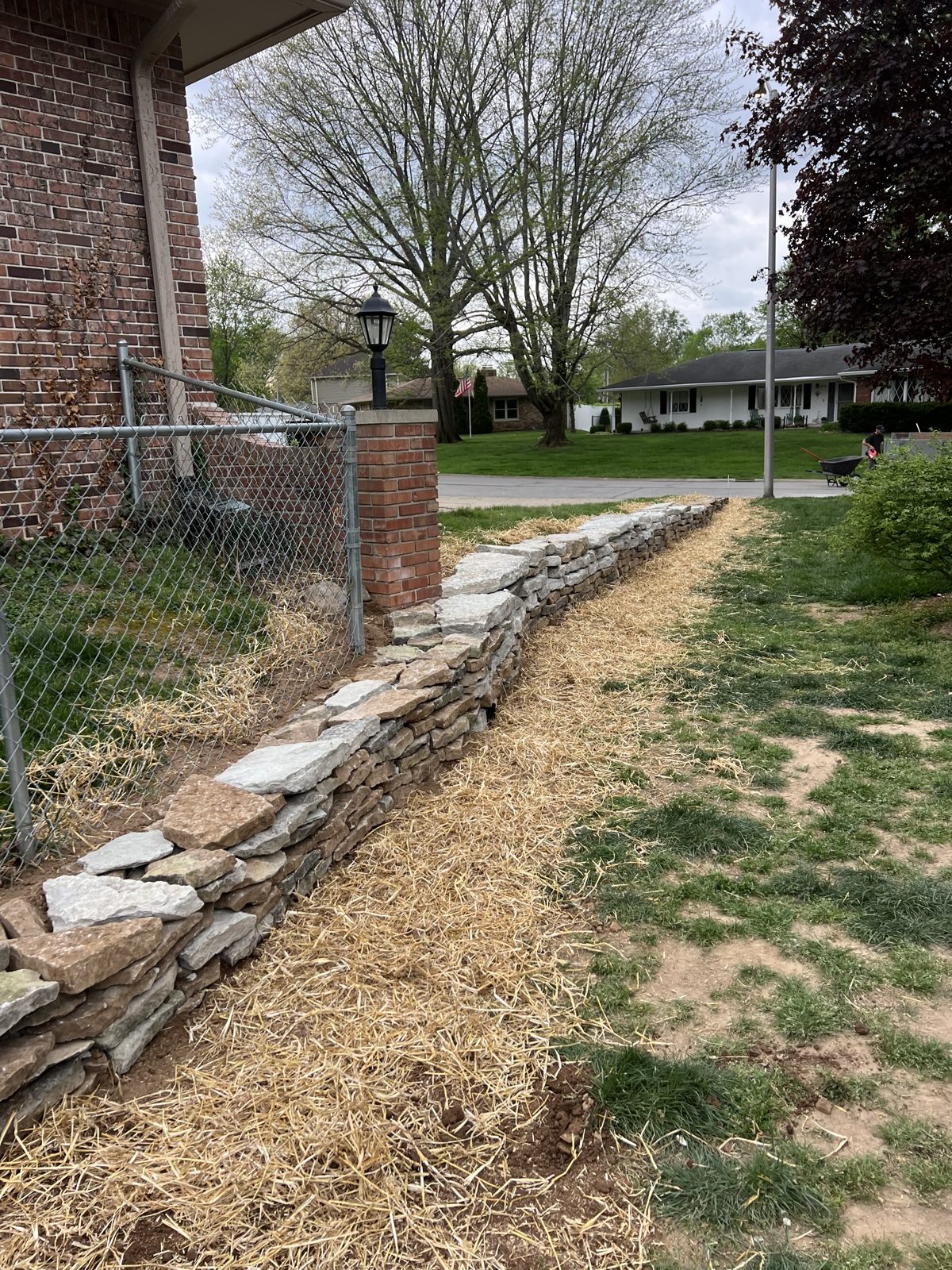 Stone retaining wall installation