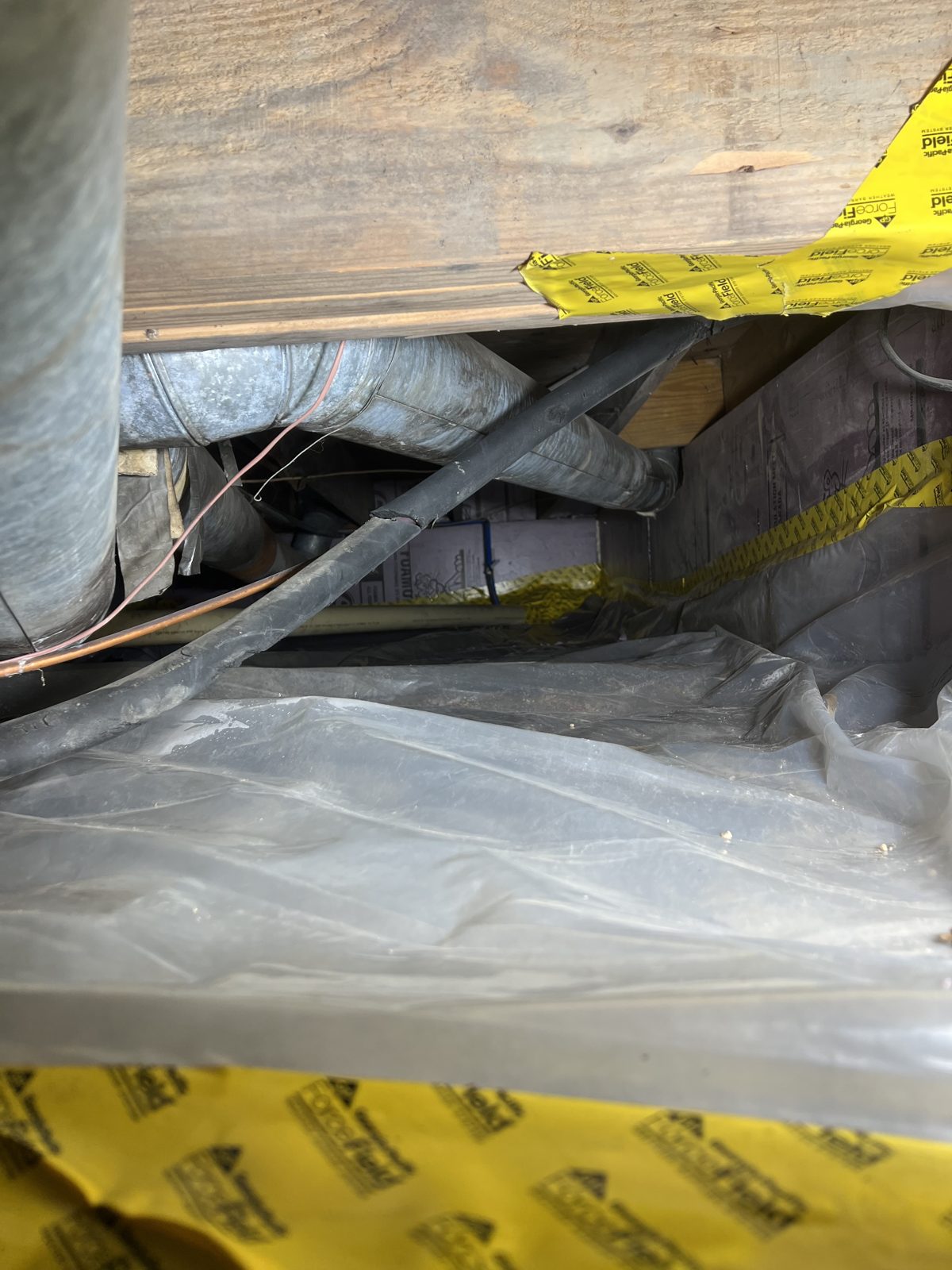 Crawl space vapor barrier with seam tape