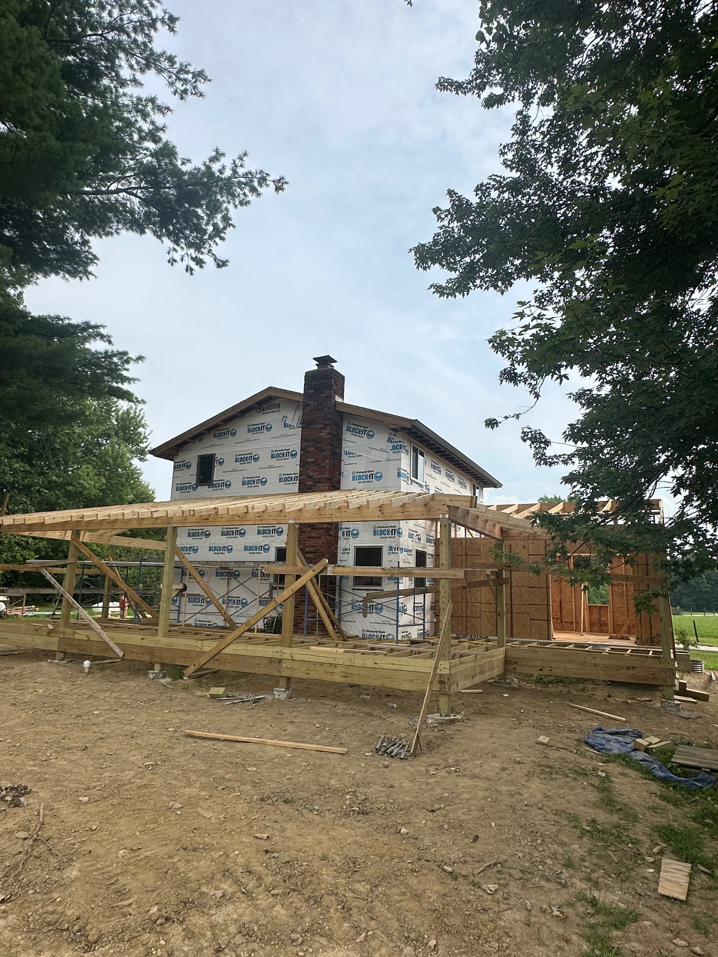 Framed addition with new floor and roof structure