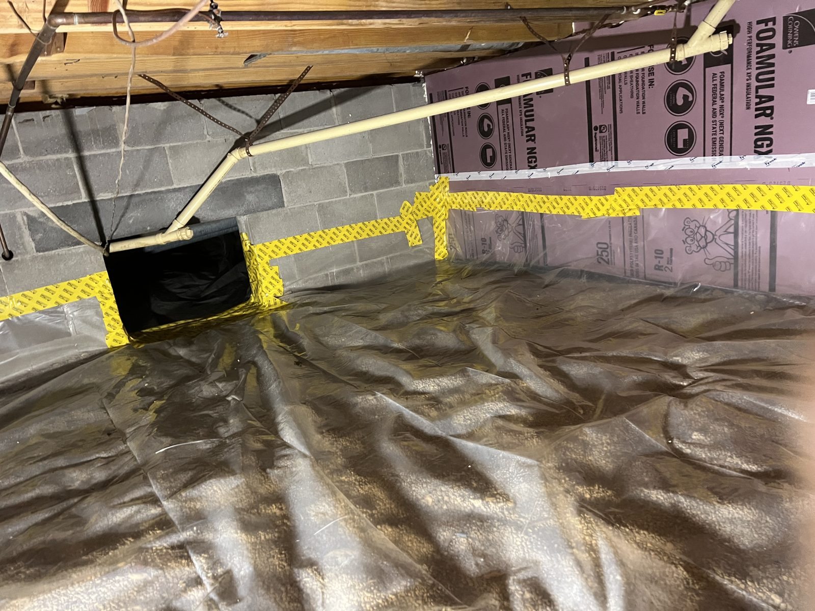 Crawl space insulation and vapor barrier work